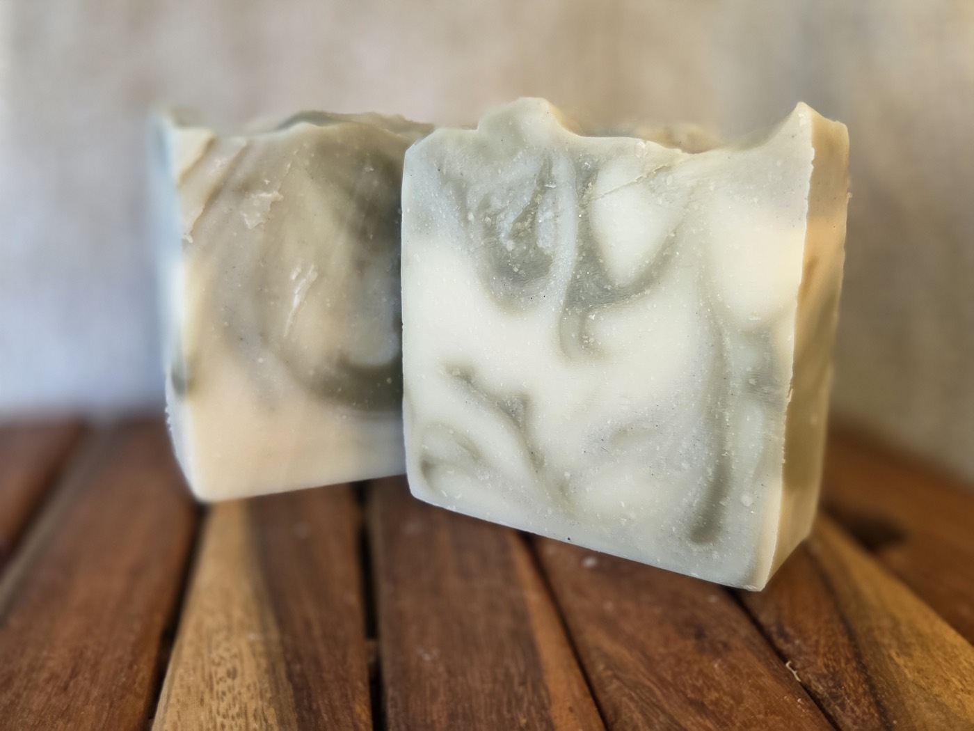 Sage-green and cream marbled swirl soap bars