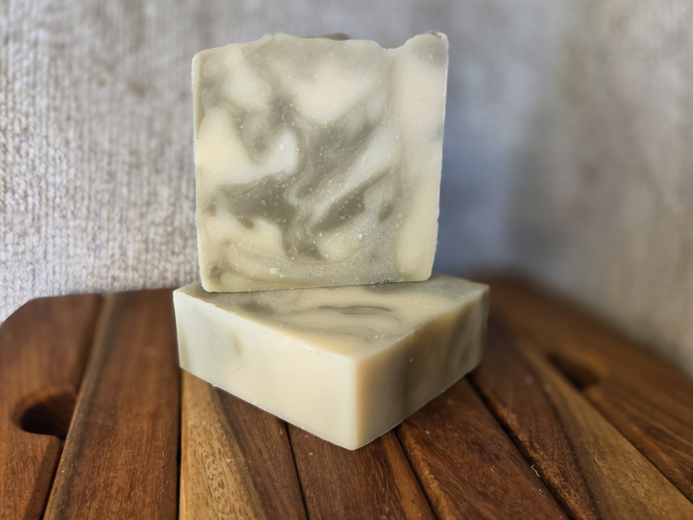 Sage-green and cream marbled swirl soap bars (alternate angle)